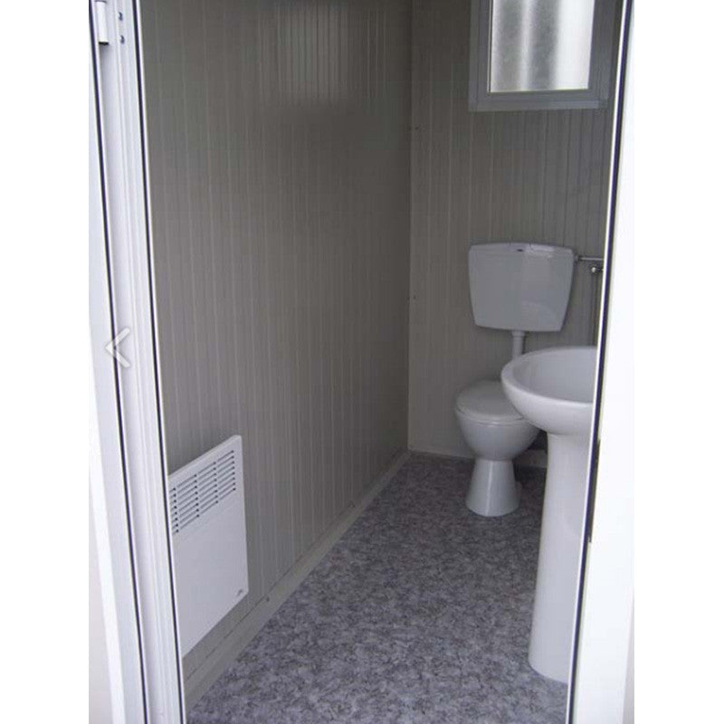 Módulo sanitario accesible con inodoro y ducha.